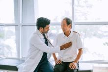 Shot of a doctor examining a patient with a stethoscope